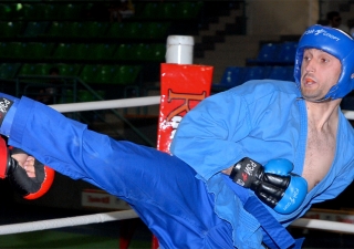 Arthur Odilbekov, 2012 World Champion in Pankration, competes inside the octagon (the arena of combat).