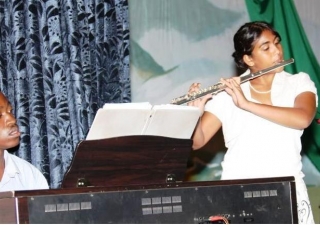 Sophia Karmali (flute) and Job Tezigatwa  (piano) from the Kampala Music School perform during the Ismaili Young Achievers Programme.        