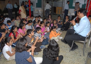 Aga Khan Scouts and Guides rehearsing a flute performance 