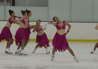 Aliyah Shaikh with her team "Starlights" at the opening exhibition at their home rink, representing the Skokie Valley Club in Buffalo Grove, Illinois 2017