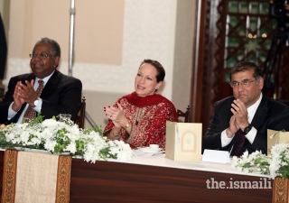 Left to right: Dr Haile T. Debas, Chairman pro-te​m, Princess Zahra Aga Khan Member, AKDN Board of Directors, and Hafiz Sherali, Ismaili Council for Pakistan President, applauding the performance at the institutional dinner held at Serena Hotel Islamabad