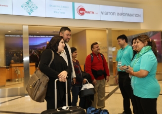 Volunteers welcome Jamati members arriving at Hartsfield-Jackson Atlanta International Airport from around the country for the Atlanta Mulaqat.