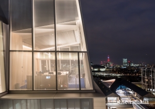 The Crown Room at the Aga Khan Centre, illuminated at night. The Aga Khan Centre in London, inaugurated by Mawlana Hazar Imam in 2018, is the permanent home of The Institute of Ismaili Studies.