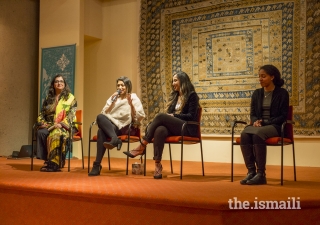 Panelists engaging in a dialogue with the audience.