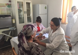 Ismaili health professionals from the US trained doctors in Khorog on heart disease. Here, a doctor checks a patient's blood pressure.