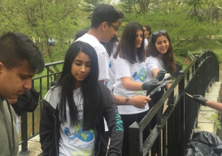 I-CERV volunteers painting bridges over streams at Manhasset Valley Park.