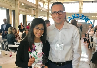 Sanya received the “2018 Be the Change award,” and is seen here with her school Principal,Mr. Sasha Kuznetsov.