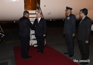 Mawlana Hazar Imam is received by Shri Sanjay Verma, Chief of Protocol, upon arriving in New Delhi.