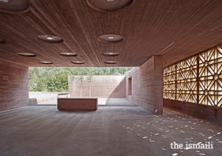 An Islamic Cemetery in Altach, Austria was presented with an Aga Khan award in 2013. Visitors are greeted by a congregation space with its wooden latticework in geometric Islamic patterns. 