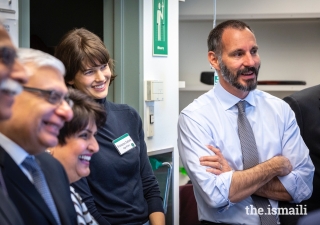 Prince Rahim and Princess Salwa share a light moment along with AKU President Firoz Rasul, Ismaili Council for USA President Dr. Barkat Fazal and Dr. Saida Rasul, during a lab tour at the Fred Hutchinson Cancer Research Center.