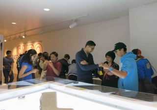 Students and teachers decide where to place their 3D-printed buildings on the Cairo exhibition model. Zulfikar Hirji