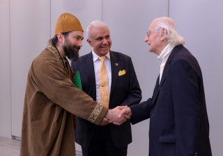 Pir Zia Inayat-Khan greets Leslie Gabriel Mezei, Holocaust survivor and Minister of the Universal Worship Service. Vazir Karsan