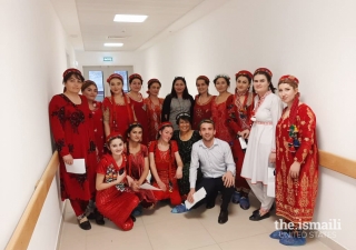 Yasmin Walji (center) celebrating Dec 13, 2019, Mawlana Hazar Imam’s birthday and one year of the opening of the Outpatient Department with AKMCK team members.