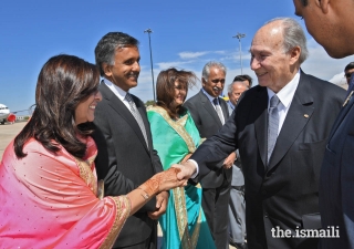 Mukhi Saheb, Mukhiani Saheba, Kamadia Saheb, and Kamadiani Saheba of Lisbon Darkhana welcome Mawlana Hazar Imam upon his arrival in Portugal.