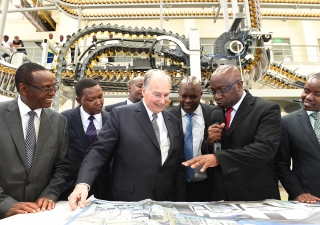 Mawlana Hazar Imam, together with leaders from the Nation Media Group, reviews the quality of the newspaper product produced by the new press. Aly Z. Ramji