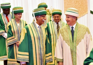 Mawlana Hazar Imam and AKU President Firoz Rasul lead the procession out of the convocation hall, followed by AKU Trustees Princess Zahra and Yusuf Keshavjee. AKDN / Zahur Ramji