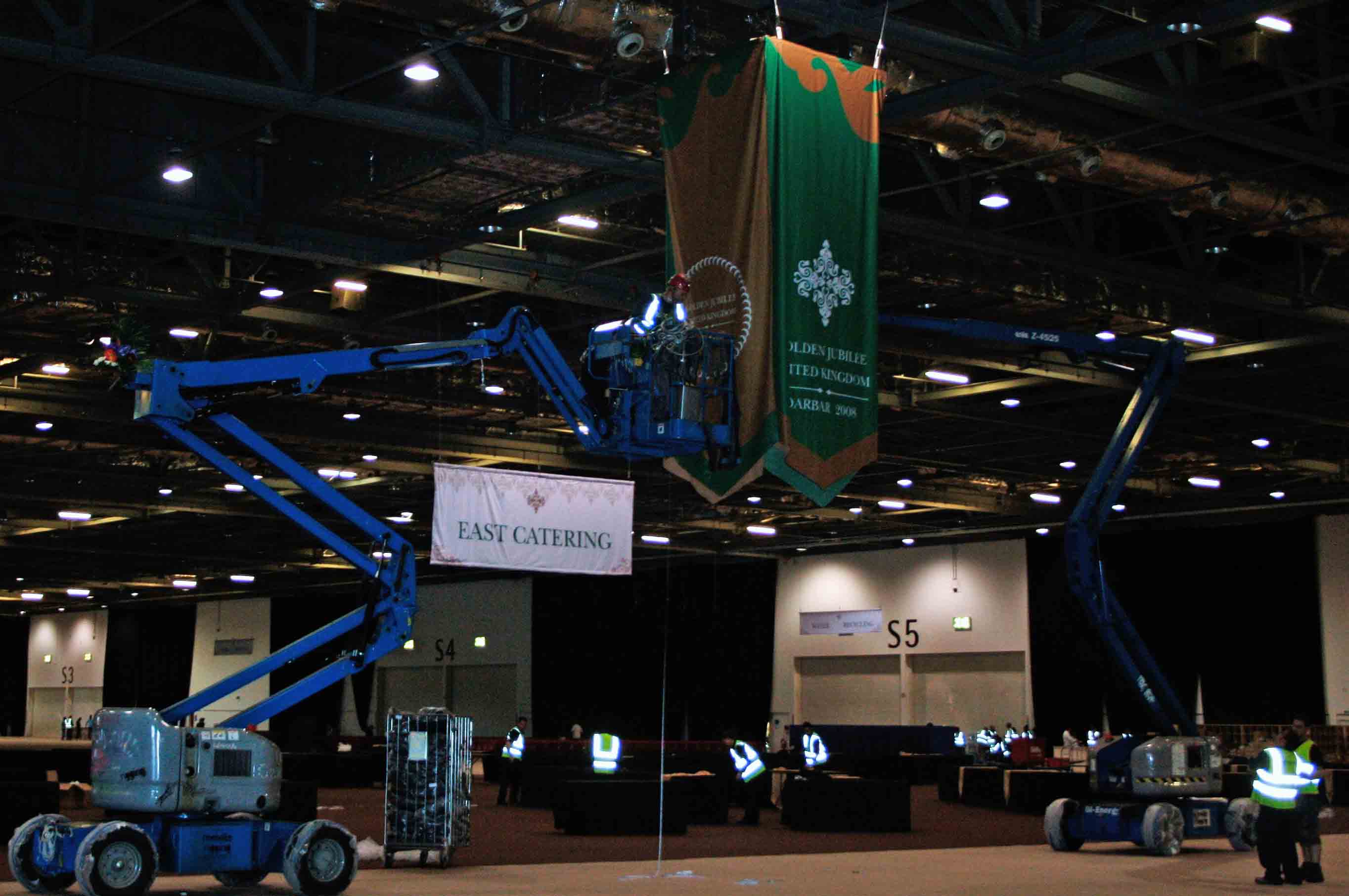 Decorations are hung at ExCeL London in preparation for Mawlana Hazar Imam's Golden Jubilee visit. Photo: Courtesy of the Ismaili Council for the UK