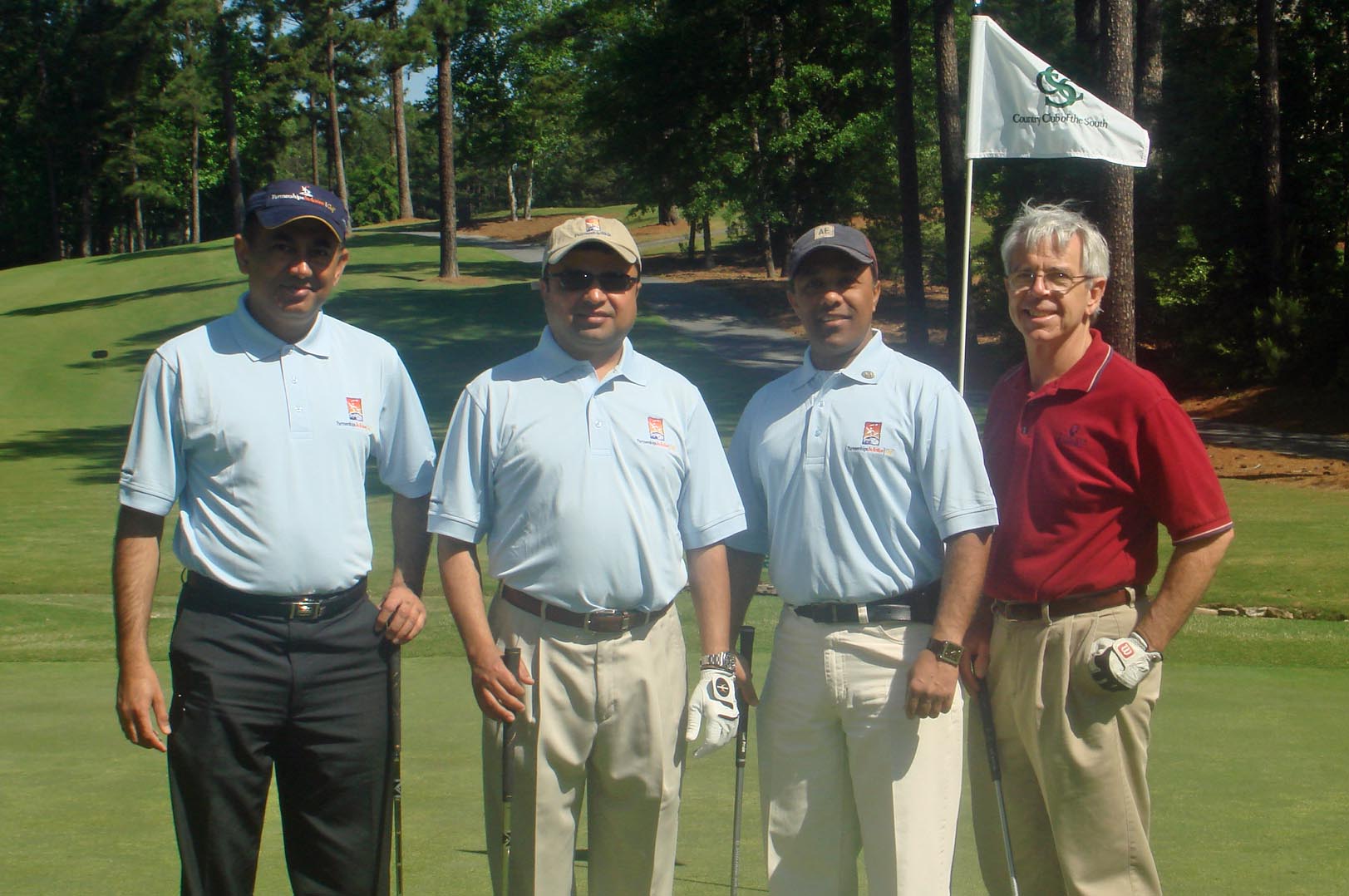 Participants pose at the Atlanta golf tournament, held at Country Club of the South. Photo: Courtesy of AKF-USA