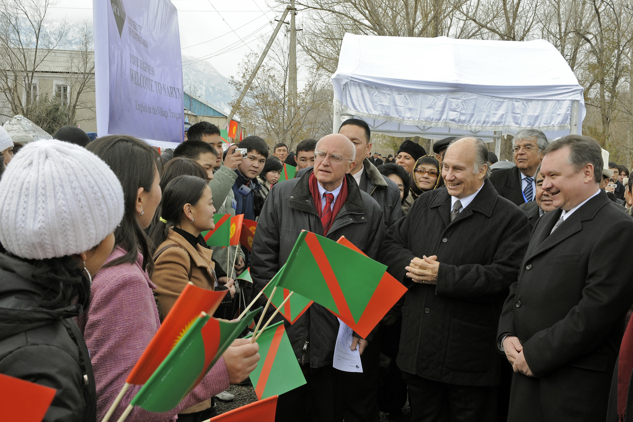 Mawlana Hazar Imam, Prime Minister Chudinov and other UCA and government officials receive a warm welcome from students at the University's town campus in Naryn. Photo: Gary Otte