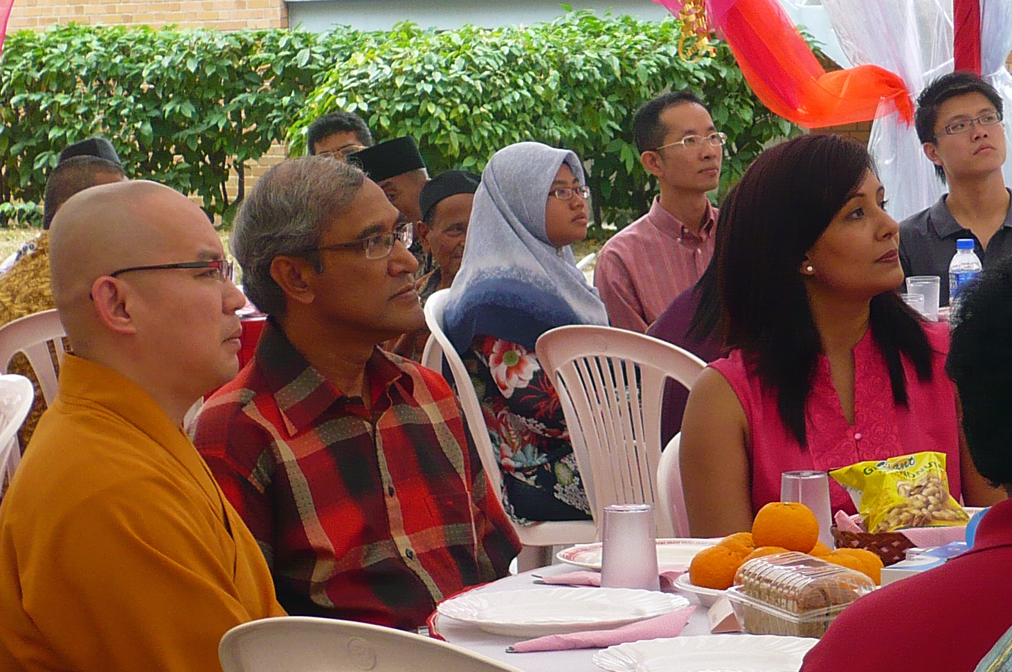 His Excellency Zainul Abidin Rasheed and Presidentbanoo Karam Bana sit with representatives of the welfare homes during the luncheon, held in conjunction with Chinese New Year celebrations in Singapore. Photo: Haneesa Habib