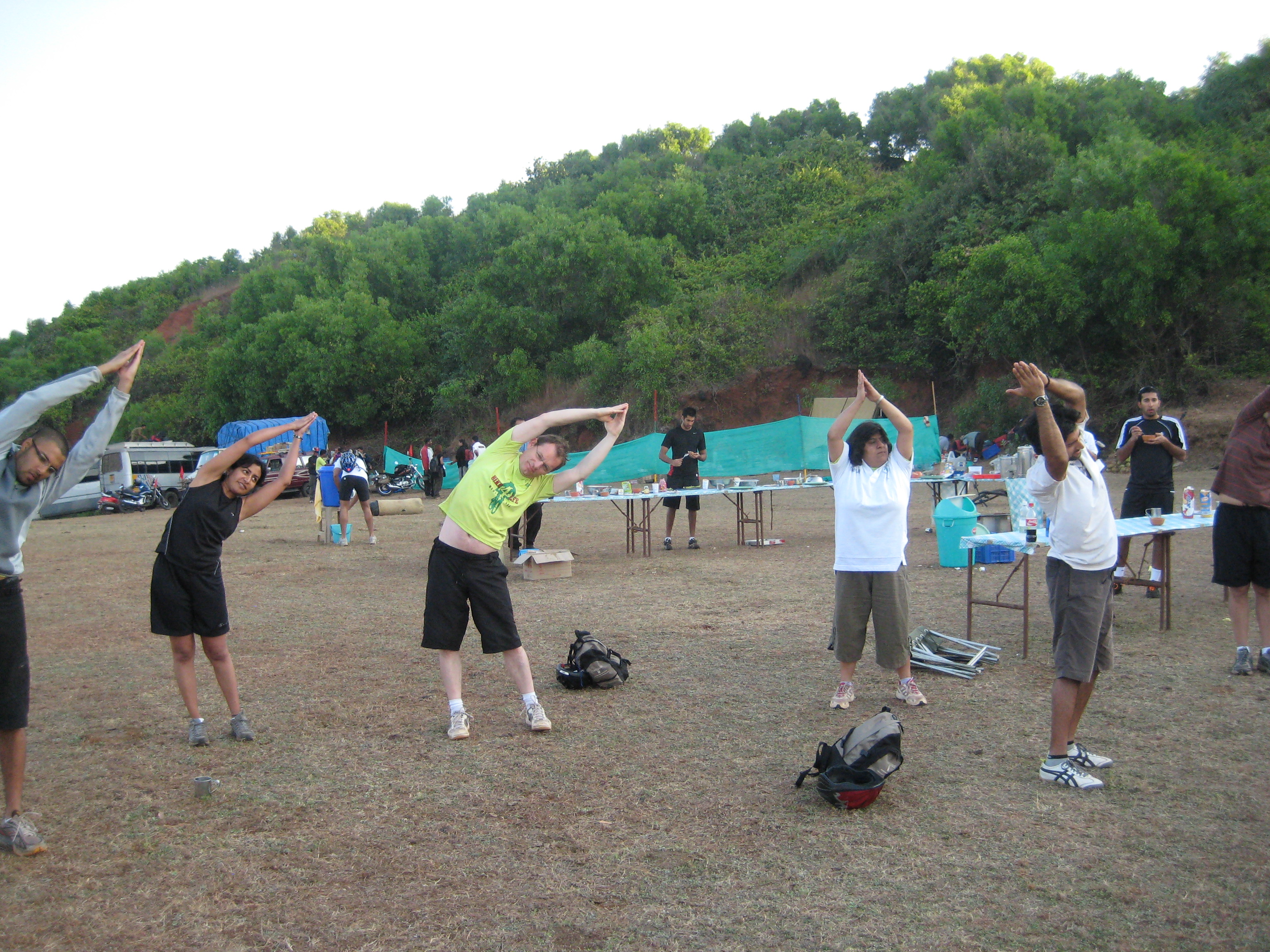 Participants began their day soon after sunrise, with warm-up exercises to get limber ahead of the day's cycling. Photo: Shahed Karim