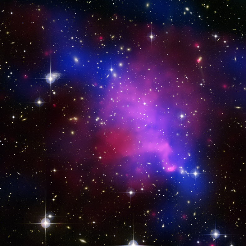 This composite of three separate images of the same galaxy cluster collision in one image allows Professor Babul to view the whole system. This method has become crucial to his research over the last decade. Photo: NASA / CXC / CFHT / UVic / A Mahdavi et al