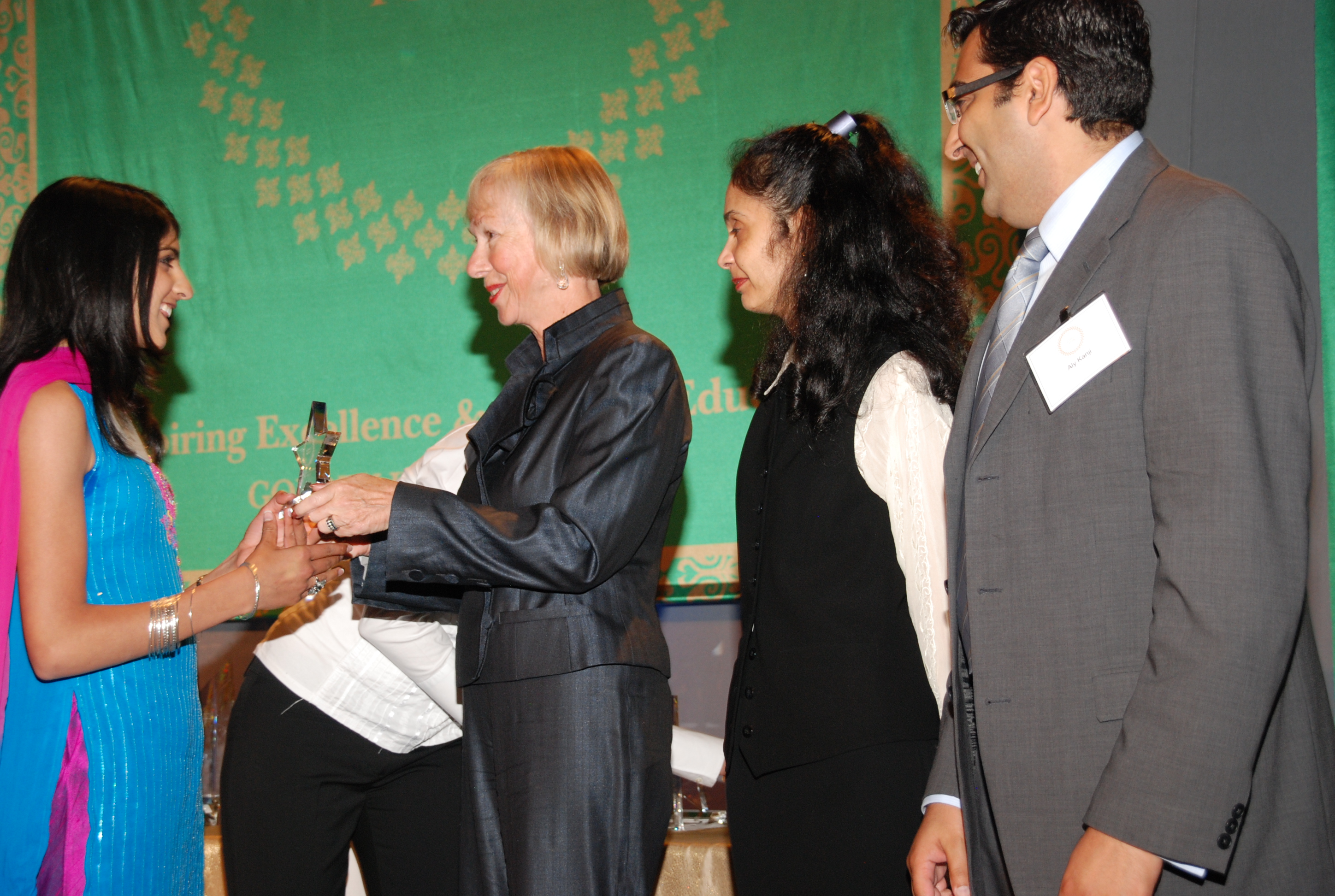 Ruth Ramsen-Wood, President of the United Way of Calgary and Area, presents the I-STAR Arts and Culture Award to one of the 2008 winners. Photo: Mohamed Ladha