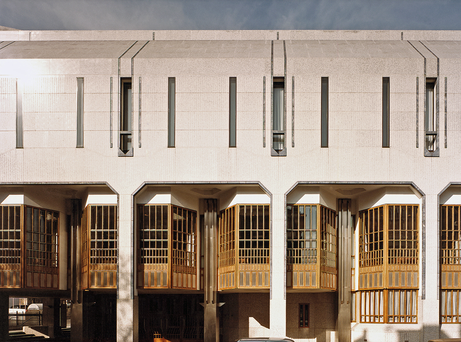 Detail showing windows and panels in stainless steel, teak and bevelled glass, with three different surface finishes to the granite. Photo: Crispin Boyle