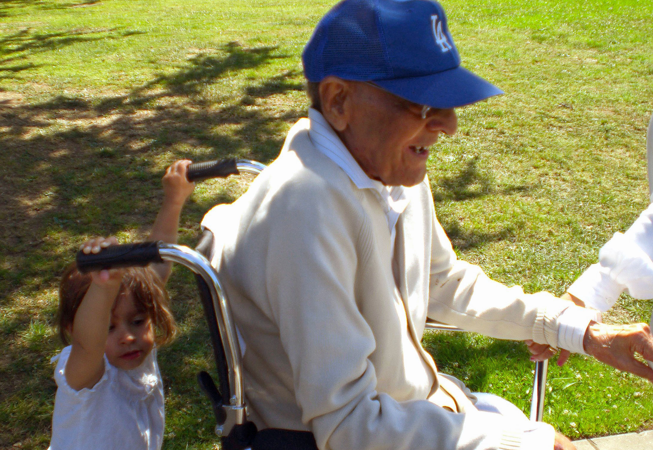 Doing her part: Little Rayna used to push the wheelchair of her late great-grandfather, Tajuddin Budhwani. Photo: Courtesy of Nilusha Patel