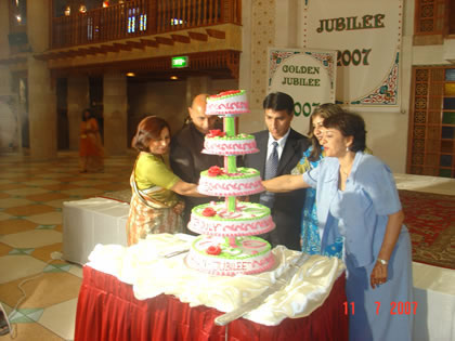 Symbolic cake cutting ceremony for the Golden Jubilee by leaders of Kuwait Jamat.