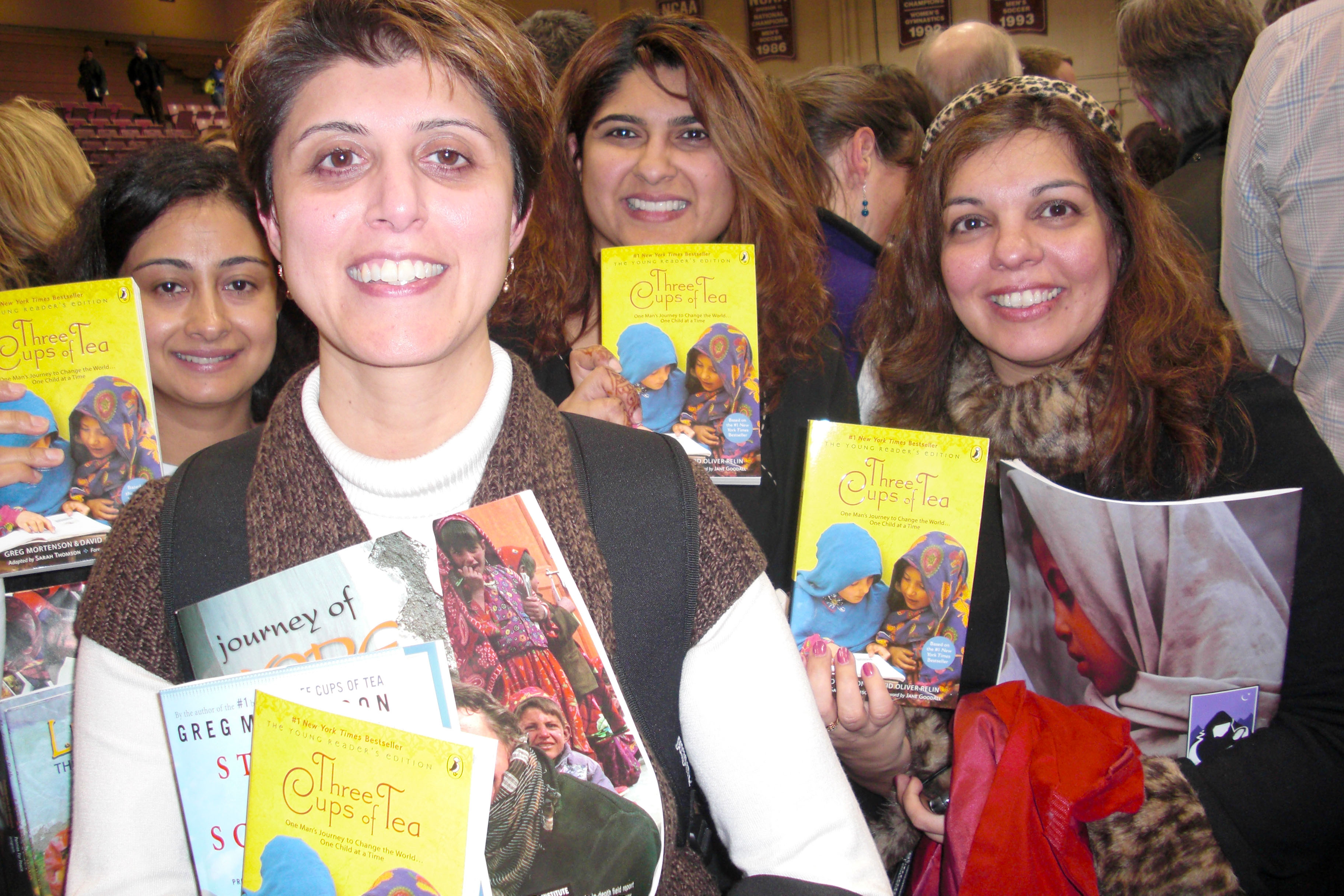 Book club members gather at a book signing event. (L to R: Shabina Premji, Zahra Dedhar, Shyna Dhanani and Shairose Gulamani.). Photo: Courtesy of Shairose Gulamani