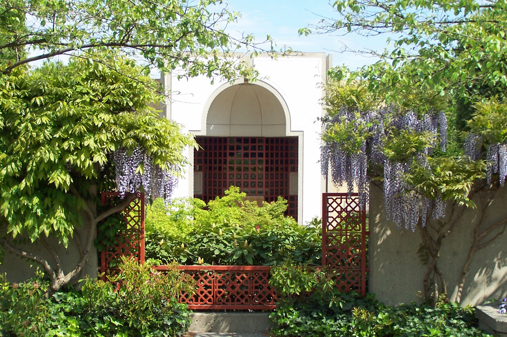 Leafy plants and fragrant flowers accent the exterior of the Ismaili Centre, Burnaby. Photo: Nurdin Dhanani