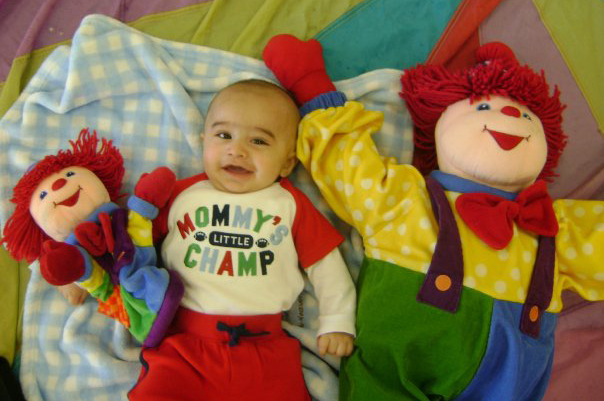 Nestled among his toys, 5-month-old Shanil Amlani will have a variety of childcare programmes to choose from. Photo: Jasmine Amlani