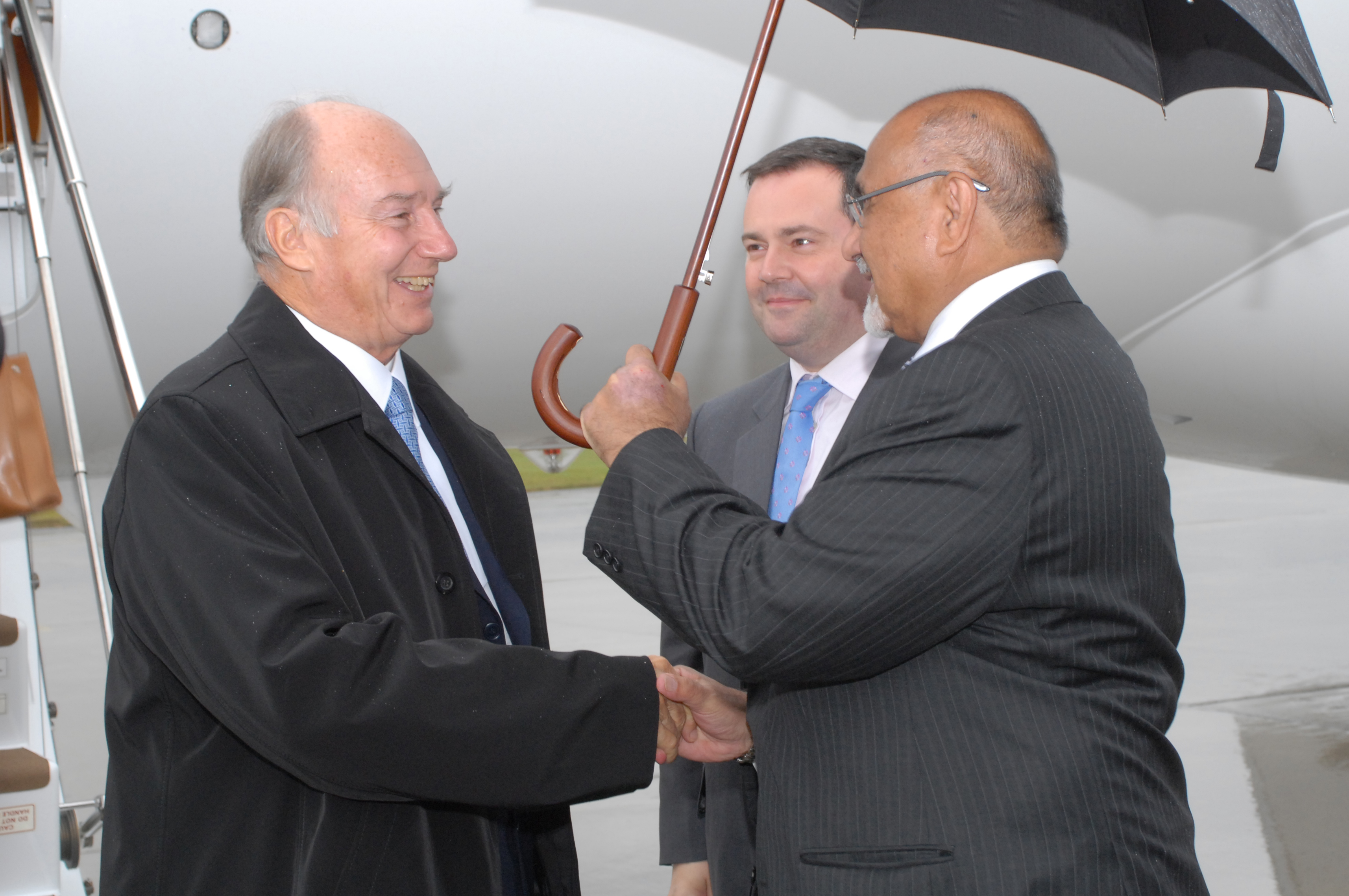 Upon his arrival in Ottawa, Mawlana Hazar Imam is greeted by Federal Minister Jason Kenney and President Mohamed Manji of the Ismaili Council for Canada. Photo: Safiq Devji