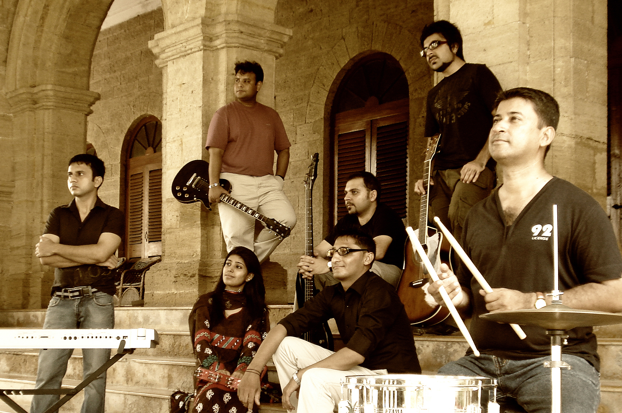 Members of the Salimahabad Orchestra. From left to right: Amirali Meghani, Naveed Rajput, Sadaf Faiz, Asif Noorani, Rahim Sundrani, Sohail Noorani, and Rafiq Vadivala. Photo: Courtesy of the Salimahabad Orchestra