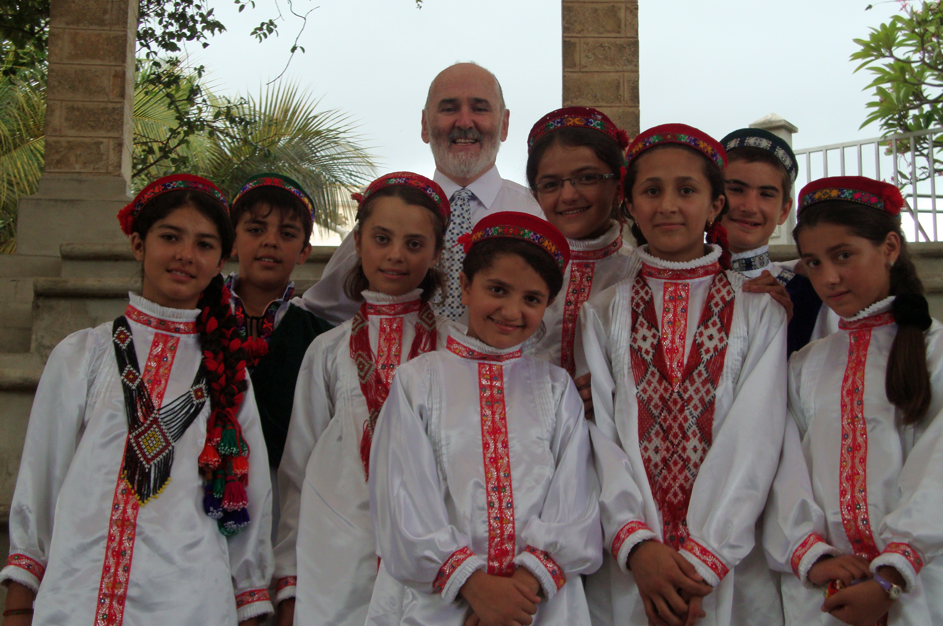 The Tajik students together with Les Wilkins, the Head of the Junior School, dressed in traditional Pamiri outfits for the Junior School Assembly celebrating Navroz. Photo: Courtesy of the Aga Khan Academy, Mombasa