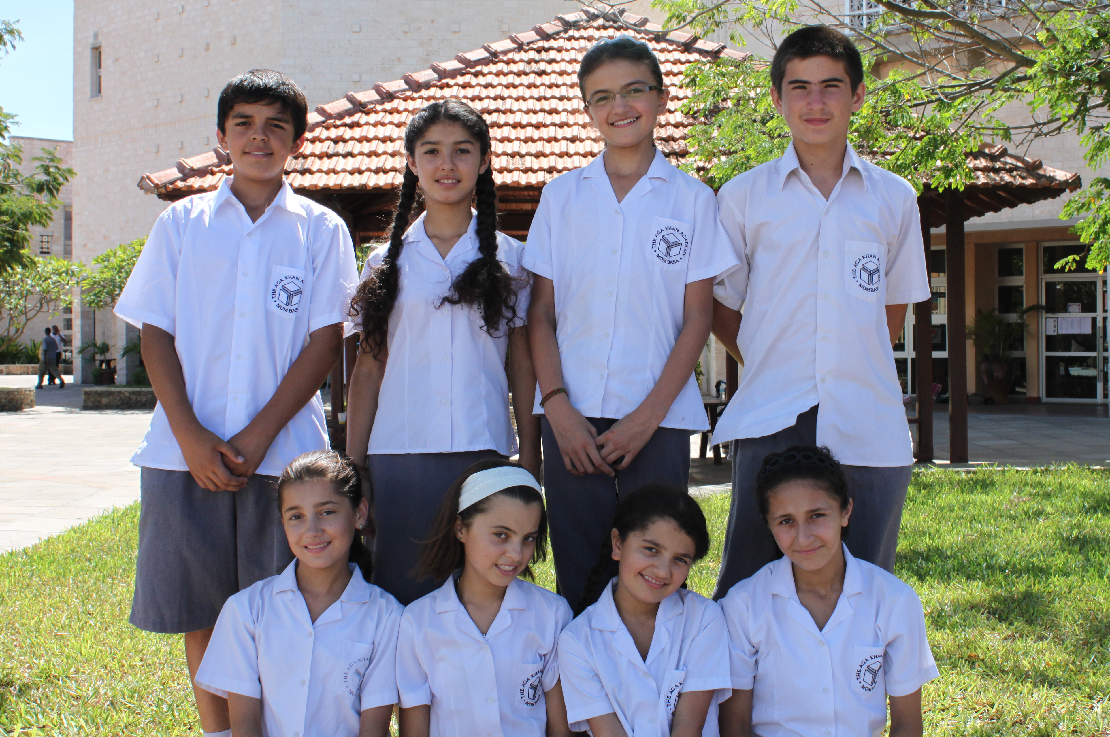 Wearing their new school uniforms, the Tajik students pose for a group shot at the Aga Khan Academy campus in Mombasa. Photo: Courtesy of the Aga Khan Academy, Mombasa