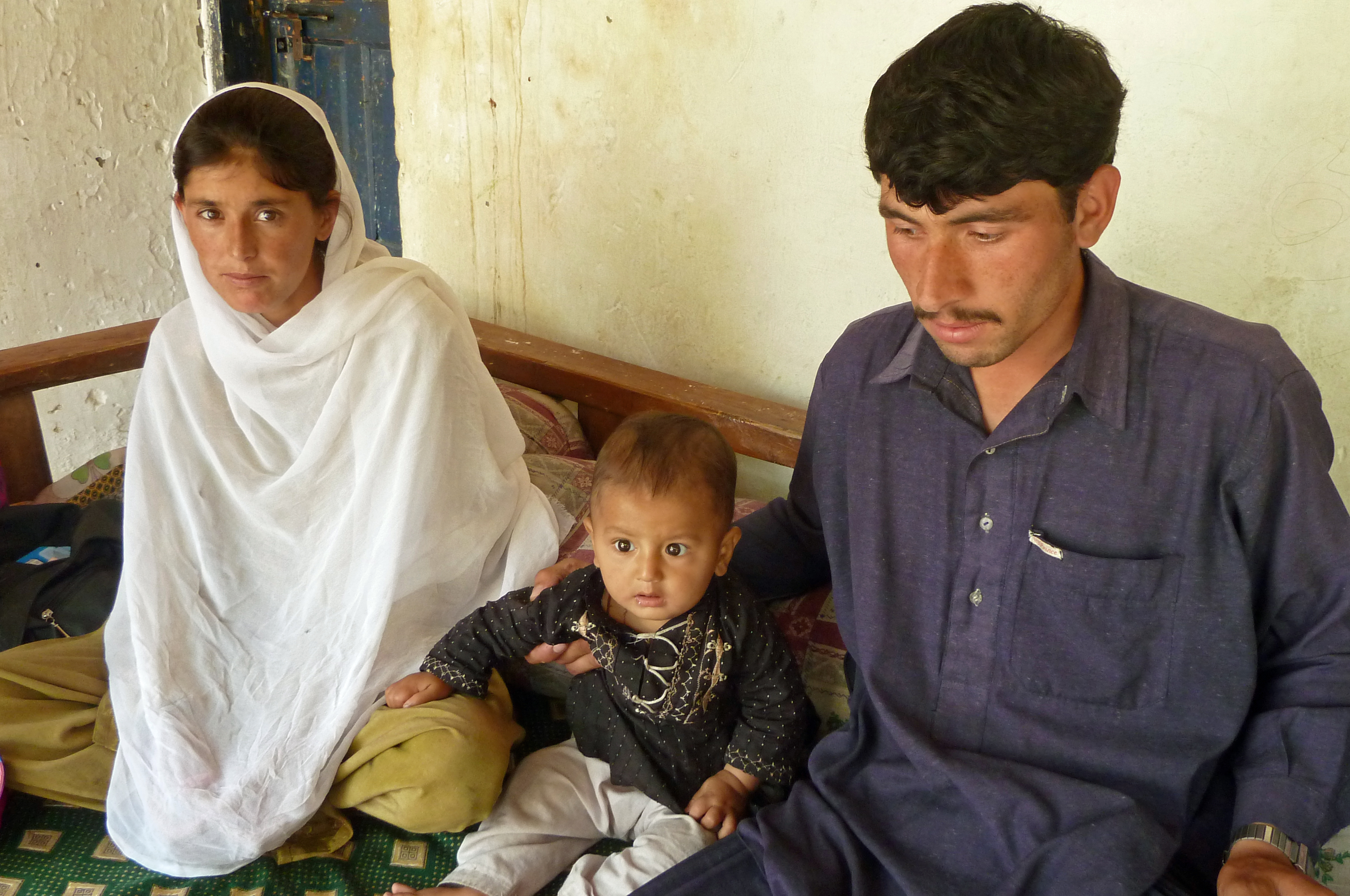 A healthy and smiling Dilshad Wali is seen with her husband and their 10-month old son Naeem. Photo: Courtesy of the Ismaili Council for Pakistan