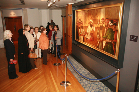 Members of the public appreciate the artifacts at the Spirit and Life Exhibition at the Ismaili Centre in London.    Photo: Abdulraheman Khakoo  