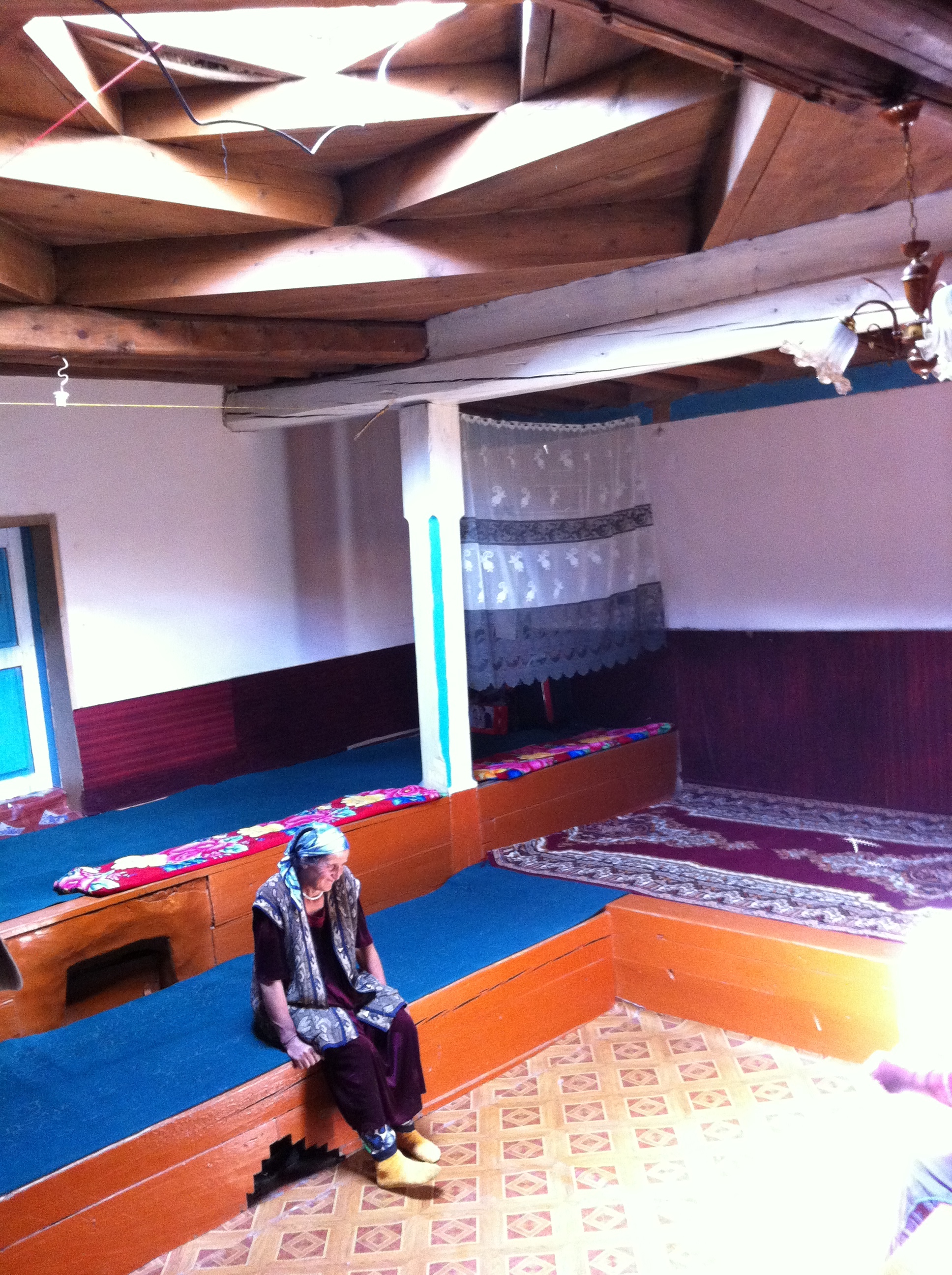 The interior of a traditional Pamiri house locally known as “chid”. What appears to be a minimalist space is in fact rich in religious and philosphical symbols, some of which can be traced back more than 2 000 years. Photo: Sehr Tejpar