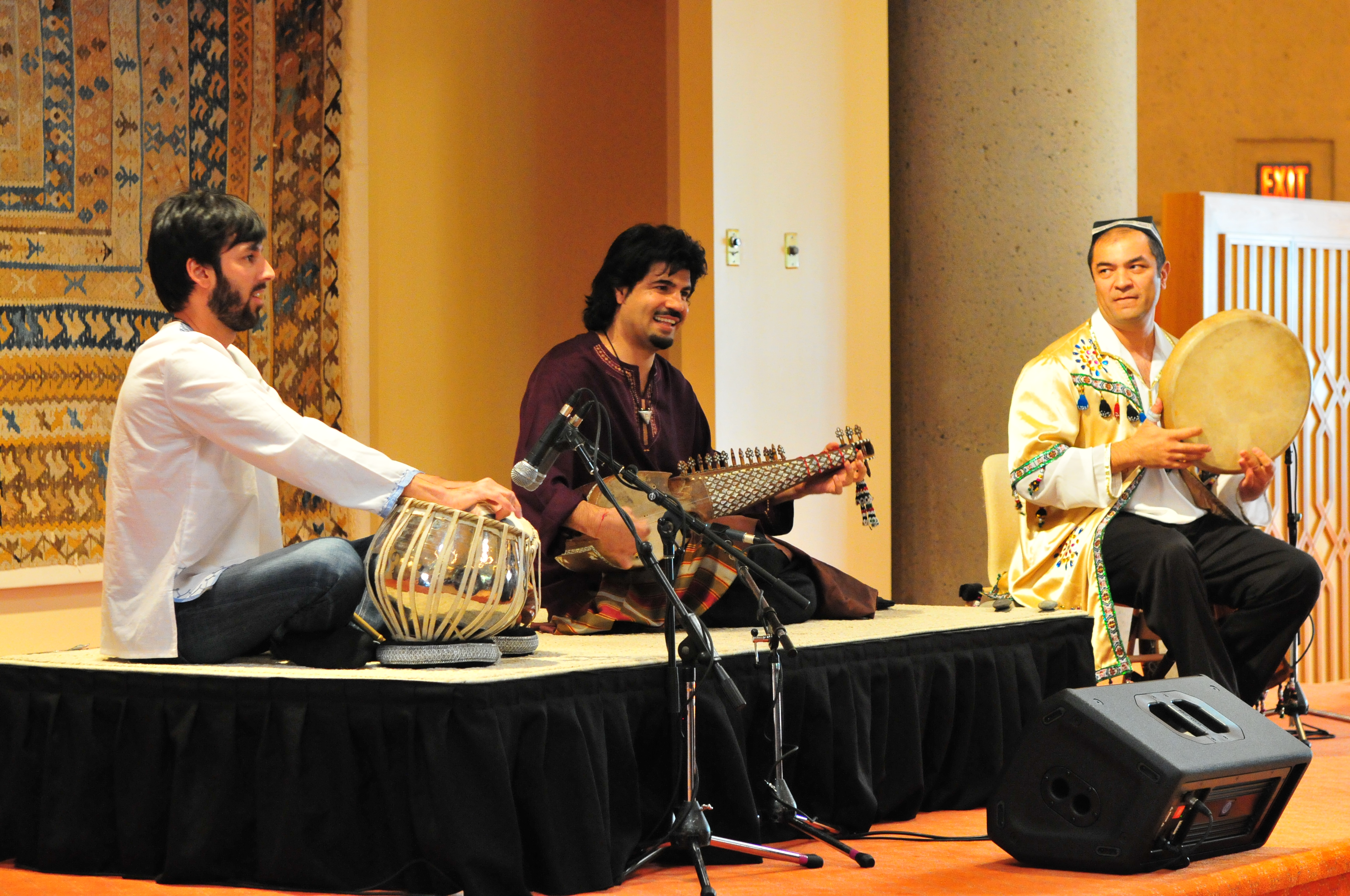 Homayun Sakhi playing the Afghan rubab with Salar Nader on tabla and Abbos Kosimov on the dayra. Photo: Sultan Baloo