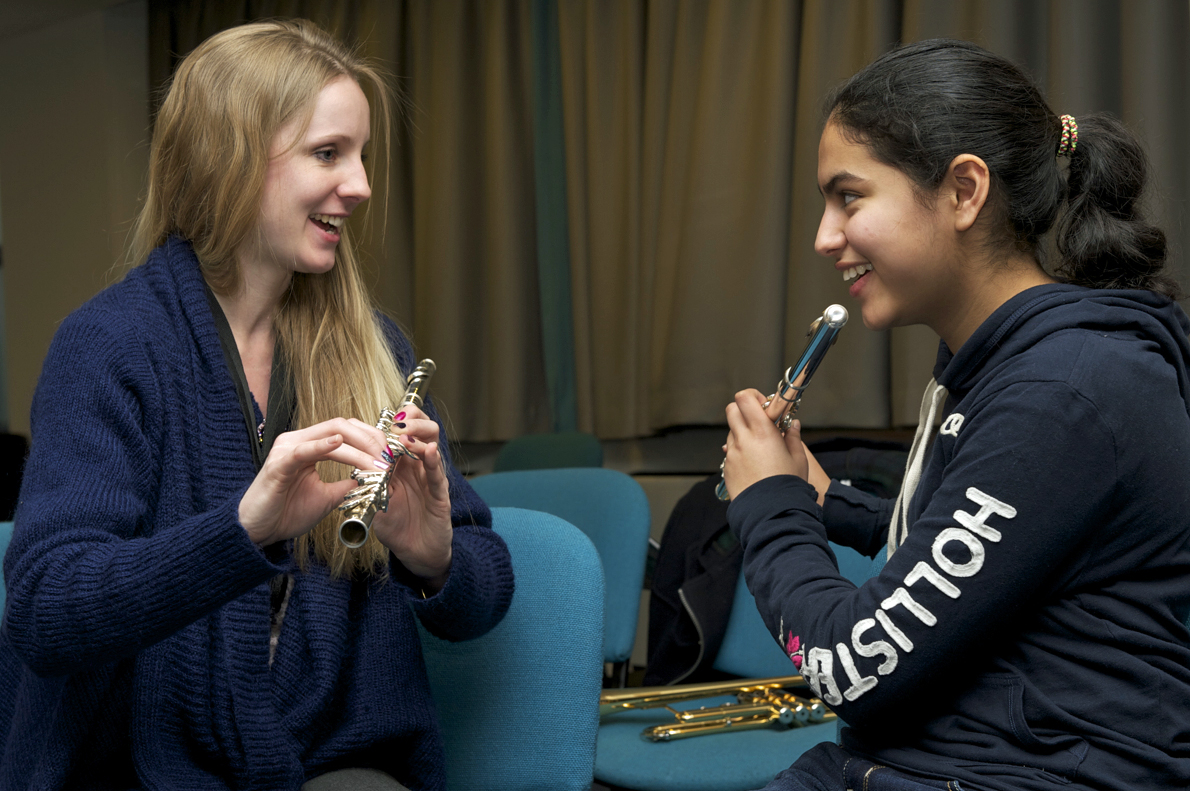 Learning an mentoring are an important part of the Ensemble. Here Ruth Currie from the Royal Philharmonic Ochestra works with Reanna Jamal, an ICE musician. Photo: Naveed Osman