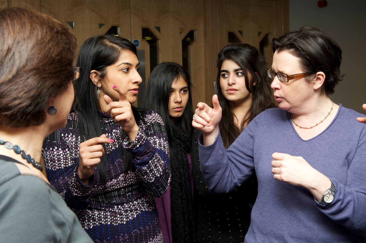 Members of Morley College Chamber Choir and vocalists from the Ismaili Community Ensemble exxhange ideas. Photo: Naveed Osman