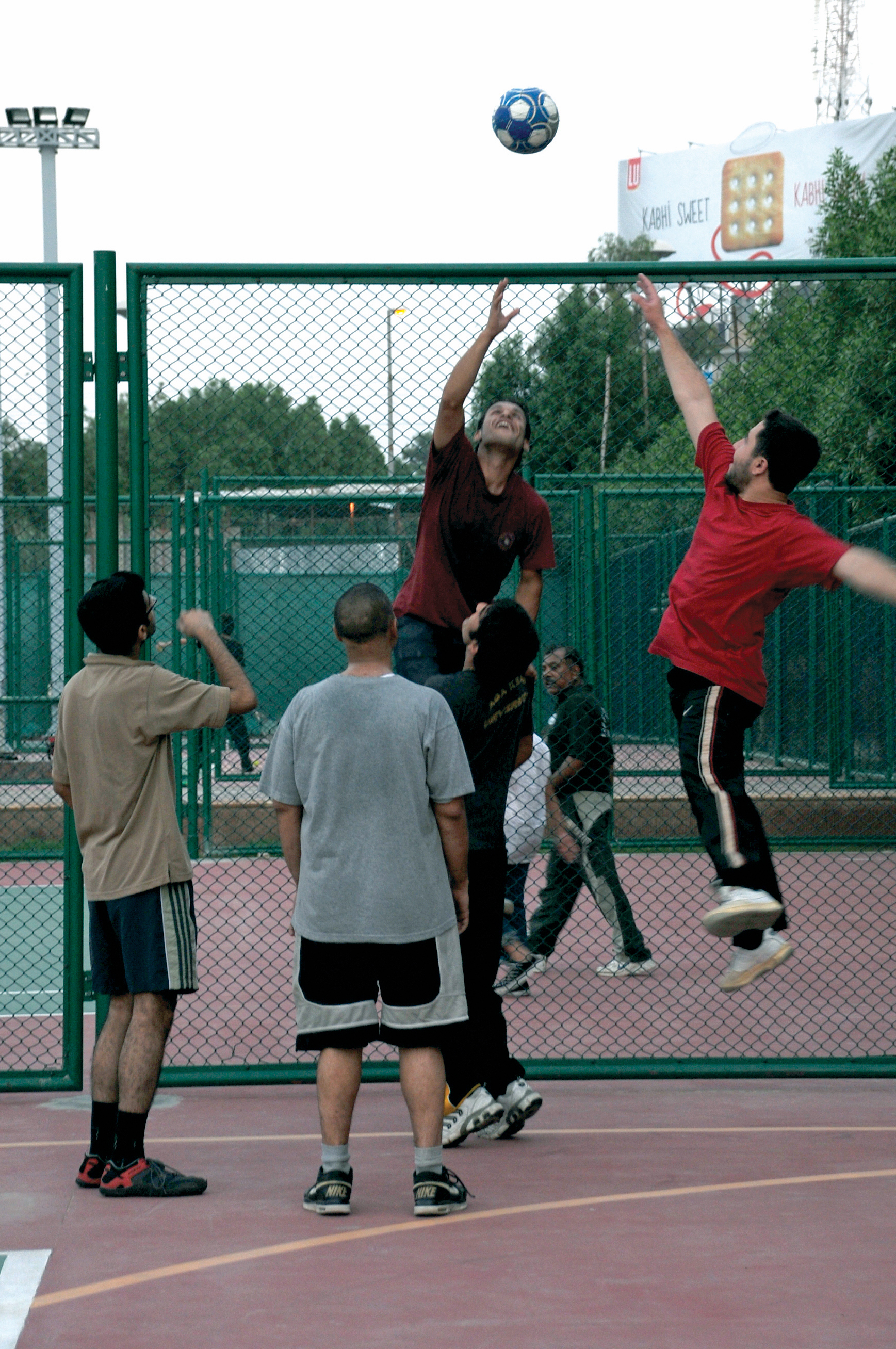 Youth play a game of volleyball at the Aga Khan University Sports Complex in Karachi. Photo: Courtesy of the Ismaili Council for Pakistan