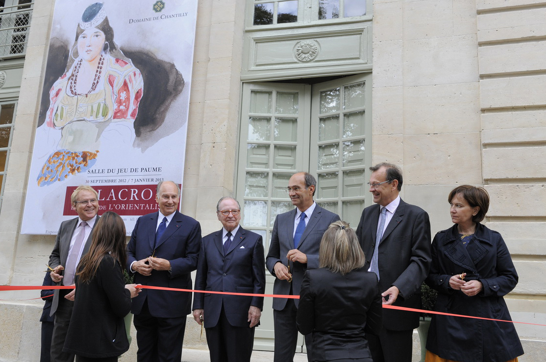 Mawlana Hazar Imam takes part in a ribbon cutting, marking the completion of four new projects in the Domaine de Chantilly and the opening of the Delacroix art exhibition in the Salle du Jeu de Paume. Photo: Gary Otte