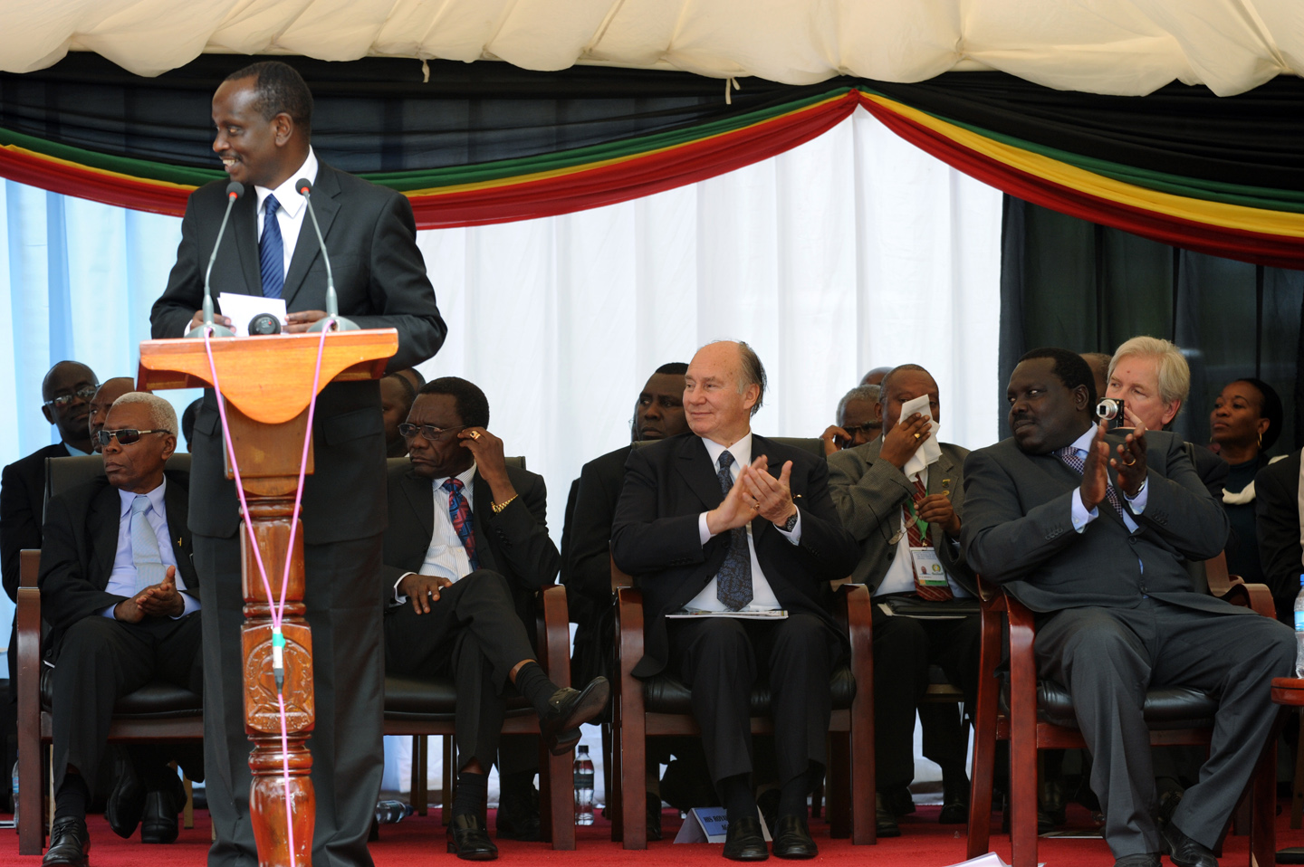 Mawlana Hazar Imam looks on as Secretary General Ambassador Dr Richard Sezibera addresses the gathering during the official opening of the East African Community Headquarters. Photo: Zahur Ramji