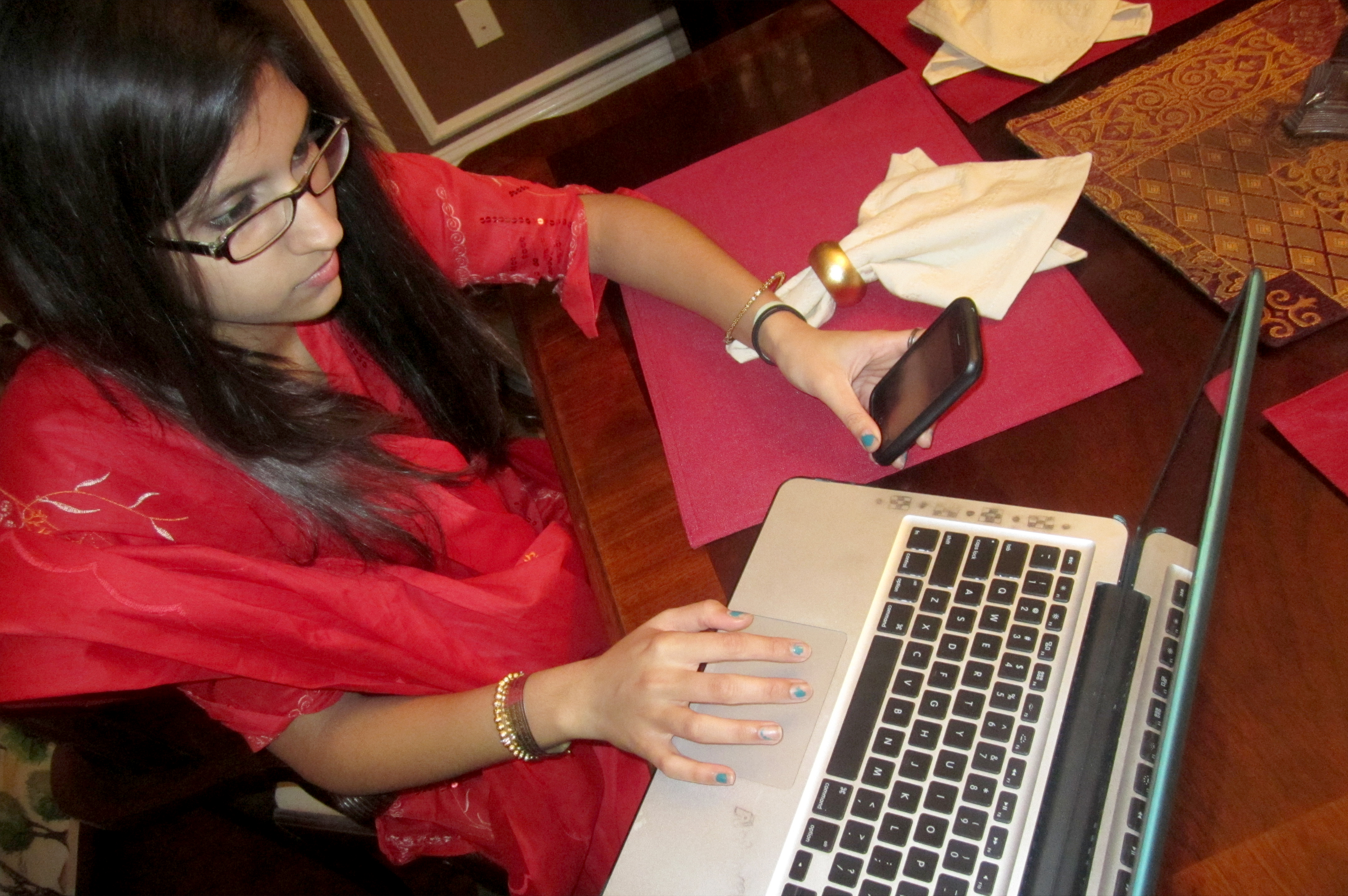 Aroosa Ajani uses social media to connect with her Girl Scouts group and to bring distant family members together on special occasions. Photo: Sumain Hemani