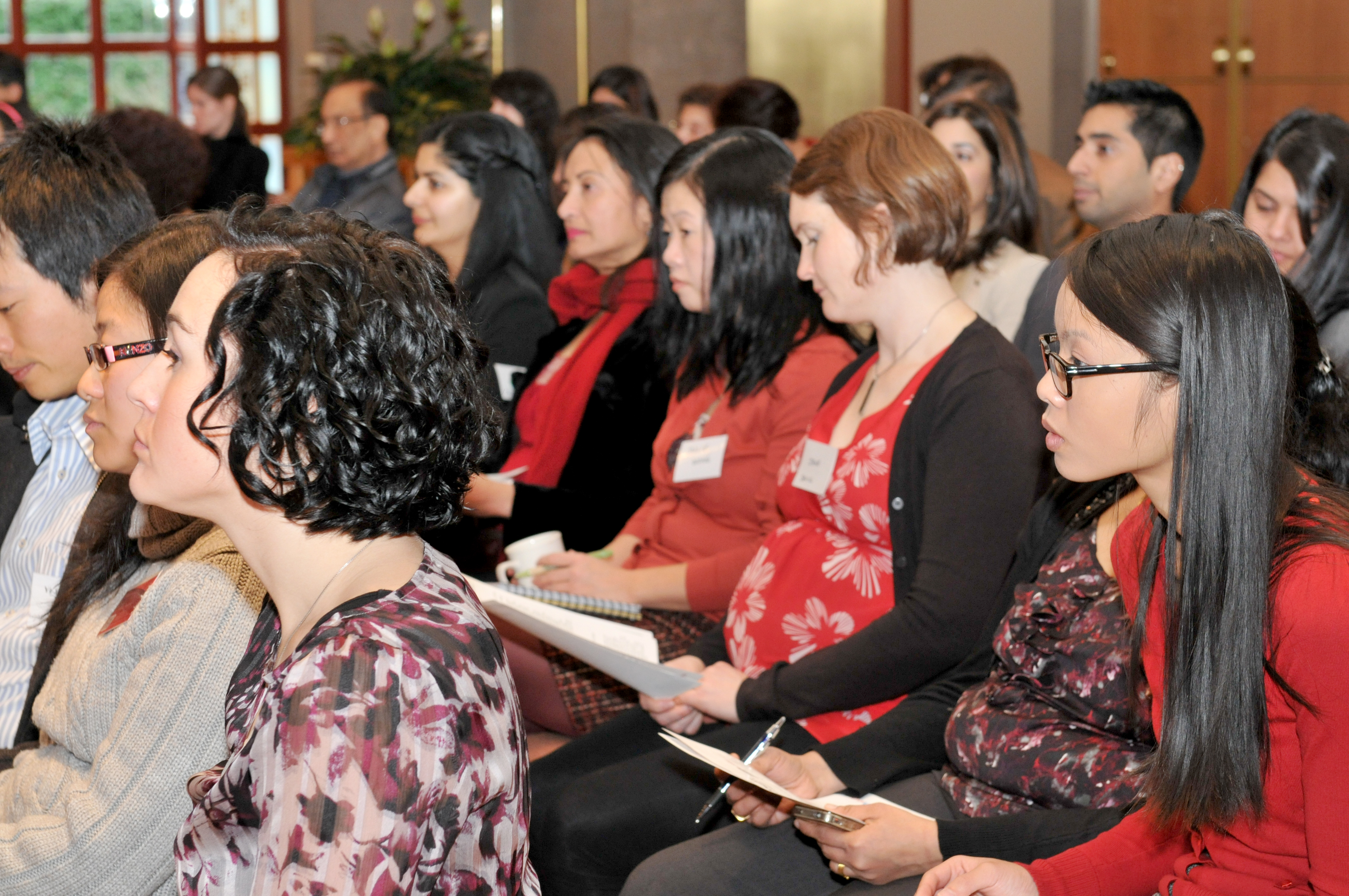 The audience takes notes as panelists share stories and offer words of wisdom at the Technovation launch, held at the Ismaili Centre, Burnaby in December 2012. Photo: Sultan Baloo