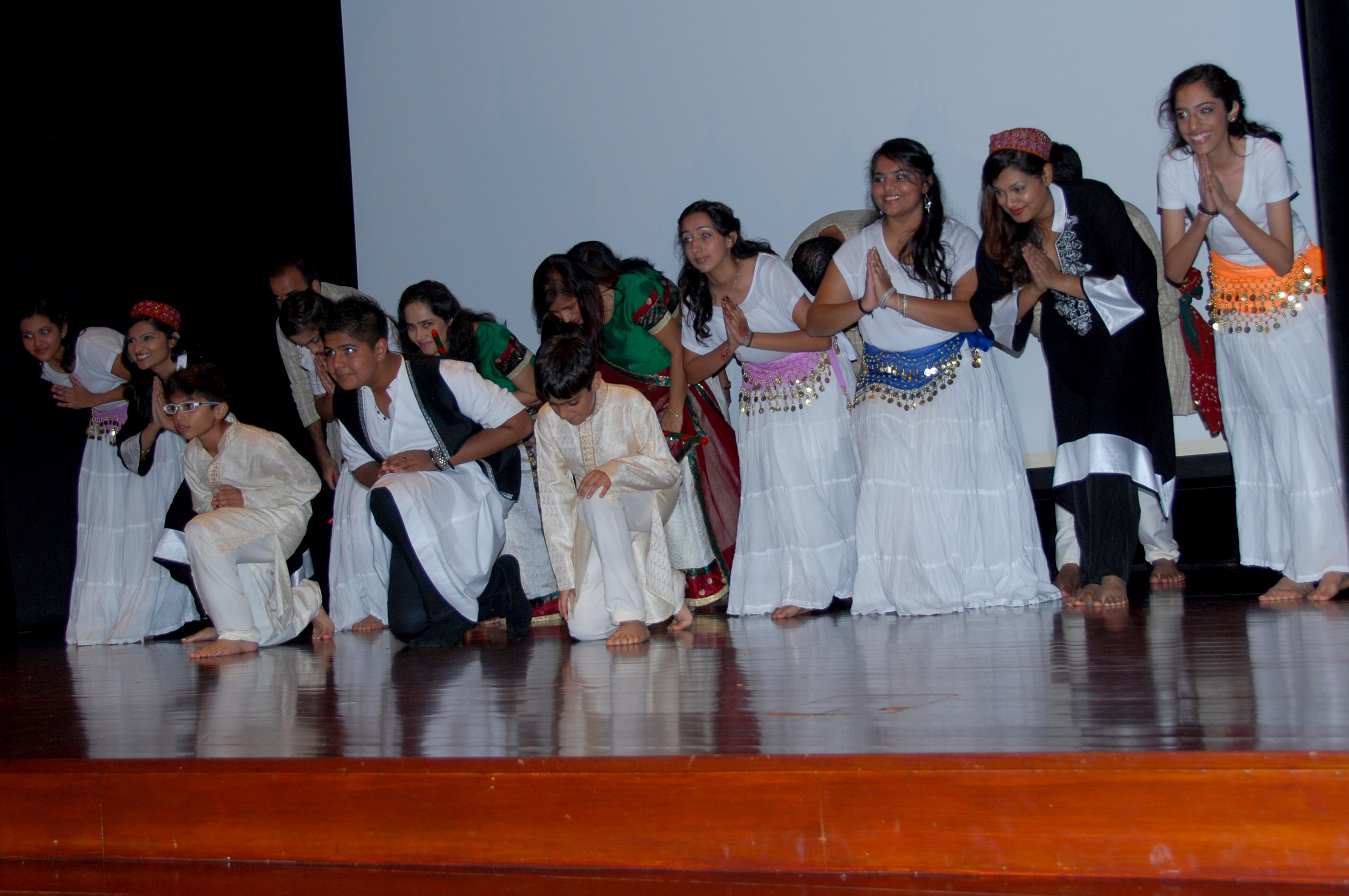 Members of the Jamat take a bow in the finale of the cultural show that they presented at the Asian Civilisations Museum. Photo: Karim Noorali