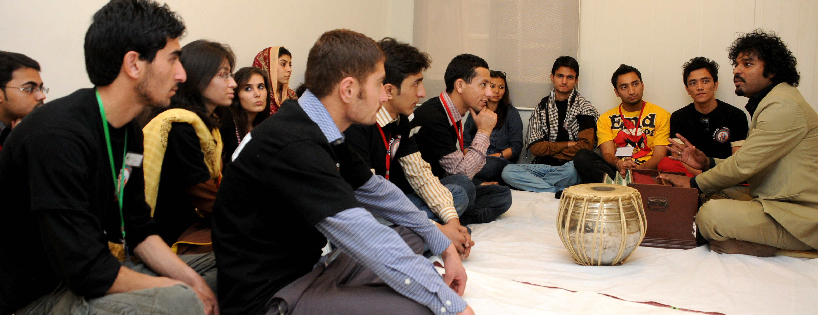 Participants take a keen interest in the music session during the National Youth Camp. Photo: The Ismaili Pakistan / Al Jalil